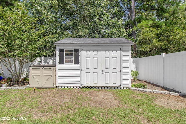 4399 Owendon Dr, Shallotte, NC 28470 - view of shed with a fenced backyard