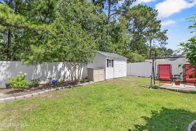 4399 Owendon Dr, Shallotte, NC 28470 - fenced backyard featuring a storage unit