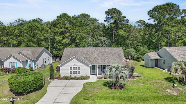 4399 Owendon Dr, Shallotte, NC 28470 - ranch-style house with a front lawn and driveway