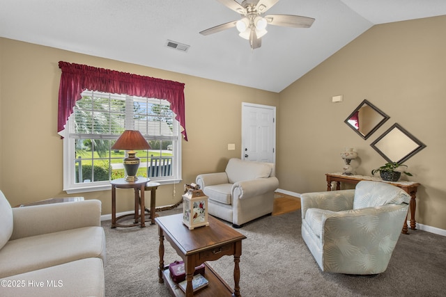 4399 Owendon Dr, Shallotte, NC 28470 - carpeted living area with a ceiling fan and vaulted ceiling