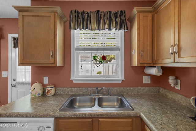 4399 Owendon Dr, Shallotte, NC 28470 - kitchen with brown cabinets and dishwasher