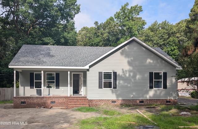 182 Wedgewood Dr, Moyock, NC 27958 - view of front facade with crawl space, a porch, and roof with shingles