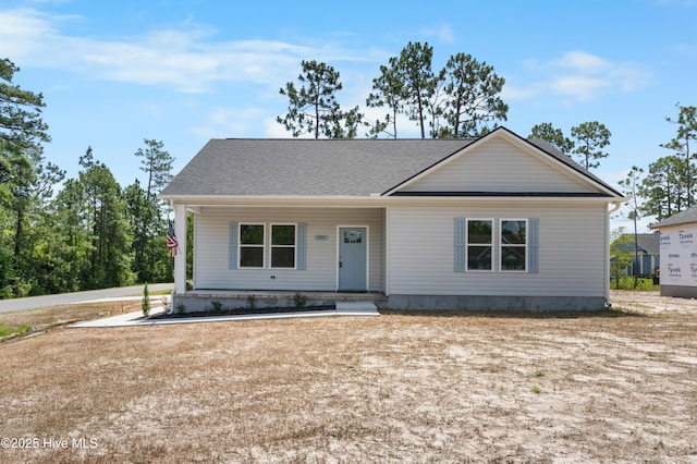 1990 Salisbury Rd, Southport, NC 28461 - view of front facade featuring a porch