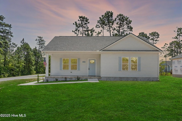 1990 Salisbury Rd, Southport, NC 28461 - view of front of house with a lawn
