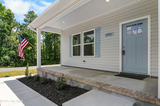 1990 Salisbury Rd, Southport, NC 28461 - entrance to property with a porch
