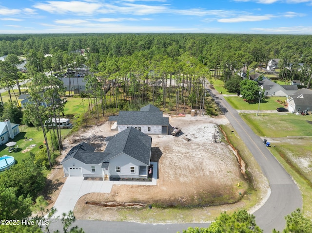 1990 Salisbury Rd, Southport, NC 28461 - aerial perspective of suburban area with a heavily wooded area