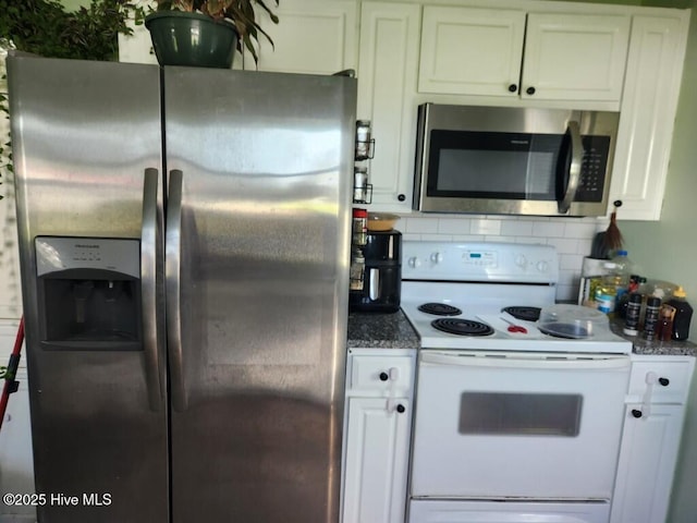 300 Morningside Dr, Vanceboro, NC 28586 - kitchen with stainless steel appliances, white cabinets, backsplash, and stone countertops