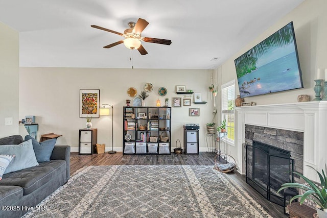 103 Baymeade Ct, Peletier, NC 28584 - living room with ceiling fan, wood finished floors, and a fireplace