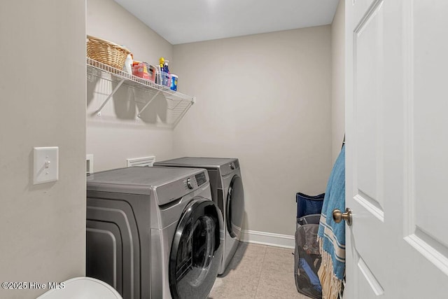103 Baymeade Ct, Peletier, NC 28584 - laundry room with washer and dryer and tile patterned flooring