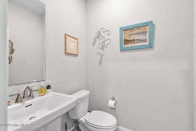 103 Baymeade Ct, Peletier, NC 28584 - bathroom with a sink and tasteful backsplash