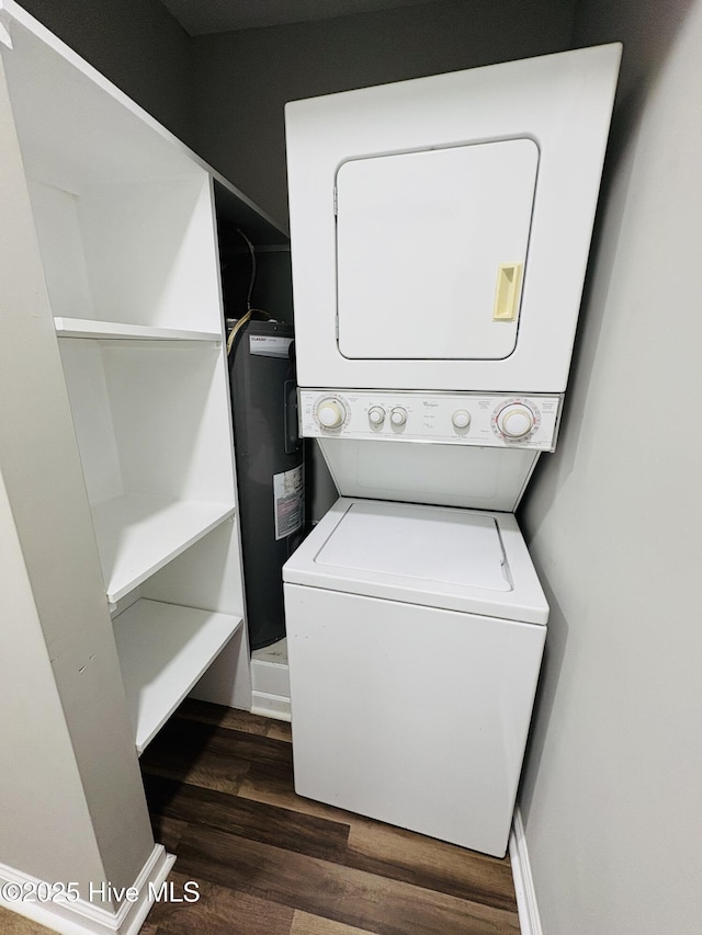 1209 Toisnot Ave NE, Wilson, NC 27893 - laundry room featuring stacked washer and clothes dryer, dark wood-style floors, and electric water heater