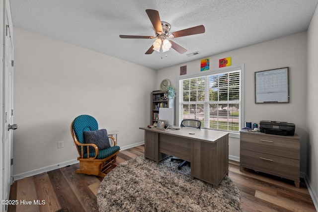 2950 Judge Manly Dr, New Bern, NC 28562 - office area featuring a ceiling fan, dark wood-style floors, and a textured ceiling