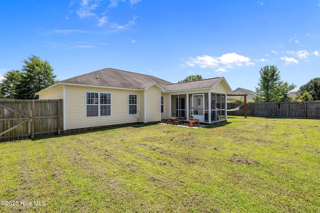 2950 Judge Manly Dr, New Bern, NC 28562 - rear view of property featuring a sunroom and a fenced backyard