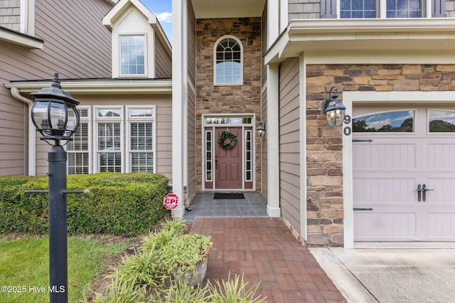 90 Shadow Creek Ct, Pinehurst, NC 28374 - doorway to property featuring stone siding, driveway, and an attached garage