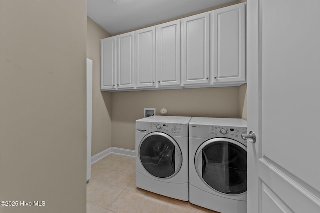 90 Shadow Creek Ct, Pinehurst, NC 28374 - laundry area with cabinet space, separate washer and dryer, and light tile patterned floors