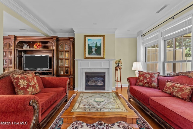 90 Shadow Creek Ct, Pinehurst, NC 28374 - living area featuring wood finished floors, crown molding, and a glass covered fireplace