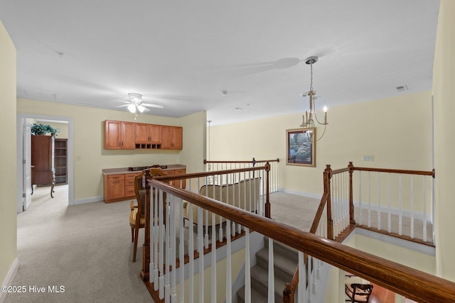 90 Shadow Creek Ct, Pinehurst, NC 28374 - hallway featuring an upstairs landing and light carpet