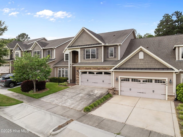 90 Shadow Creek Ct, Pinehurst, NC 28374 - view of front of house with concrete driveway, stone siding, and roof with shingles