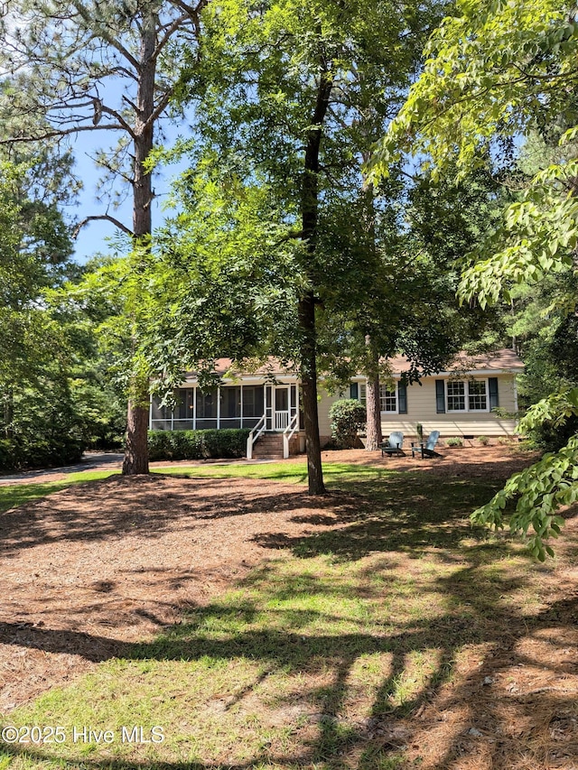 106 Brown Bark Rd, West End, NC 27376 - view of grassy yard featuring a sunroom
