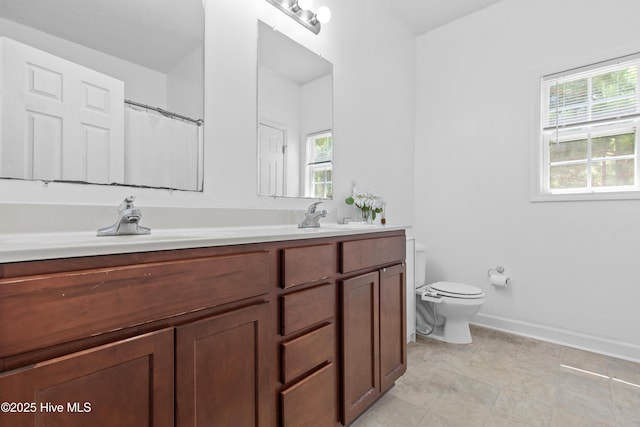 110 Whiteleaf Dr, Jacksonville, NC 28546 - bathroom featuring double vanity and toilet