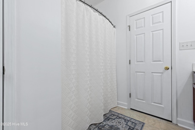 110 Whiteleaf Dr, Jacksonville, NC 28546 - bathroom featuring baseboards and a shower with curtain