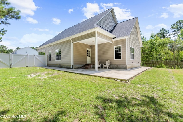 110 Whiteleaf Dr, Jacksonville, NC 28546 - back of property with a gate, entry steps, a shingled roof, and a fenced backyard