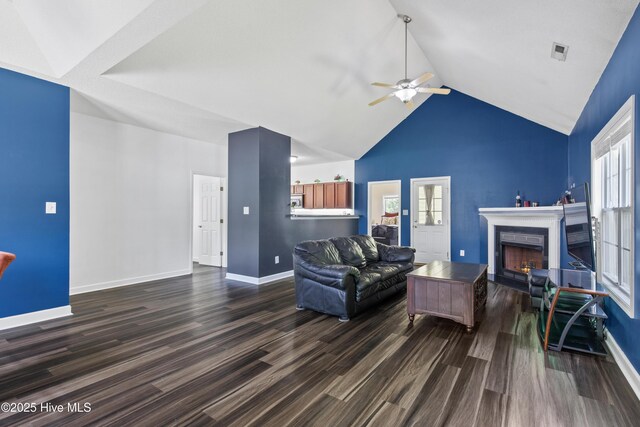 110 Whiteleaf Dr, Jacksonville, NC 28546 - living room with dark wood-type flooring, a fireplace, ceiling fan, and high vaulted ceiling