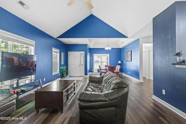 110 Whiteleaf Dr, Jacksonville, NC 28546 - living room featuring wood finished floors, lofted ceiling, a ceiling fan, and a chandelier