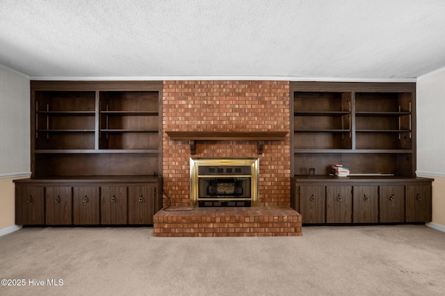 1603 Laurel St, Goldsboro, NC 27530 - unfurnished living room featuring carpet, a fireplace, ornamental molding, and a textured ceiling