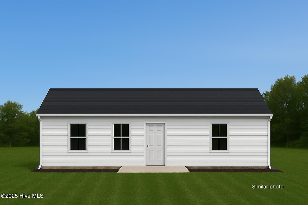 5650 County Line Rd, New Bern, NC 28562 - back of house with a lawn