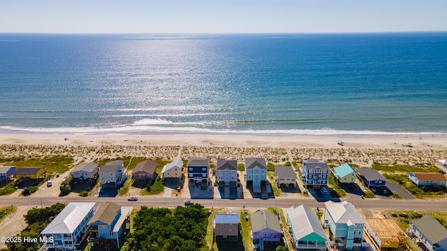 163 NW 4th St, Oak Island, NC 28465 - aerial perspective of suburban area featuring unending shoreline