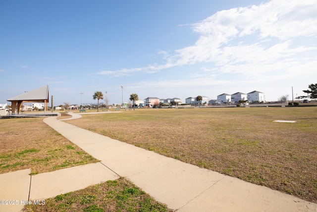 163 NW 4th St, Oak Island, NC 28465 - view of community featuring a gazebo and a lawn