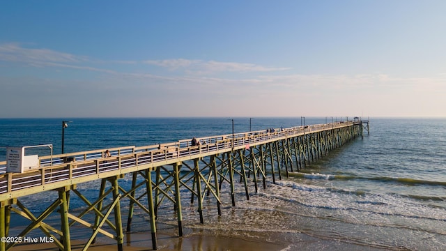 163 NW 4th St, Oak Island, NC 28465 - dock area featuring a pier and a water view