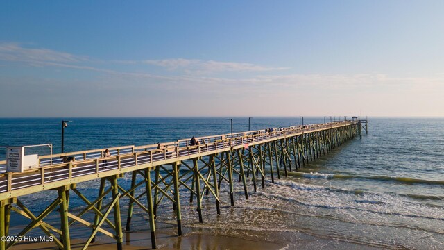 163 NW 4th St, Oak Island, NC 28465 - dock area featuring a pier and a water view