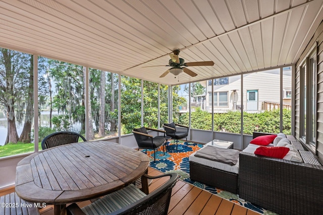 5410 Trade Winds Rd, New Bern, NC 28560 - deck with an outdoor hangout area, a ceiling fan, outdoor dining space, and a water view