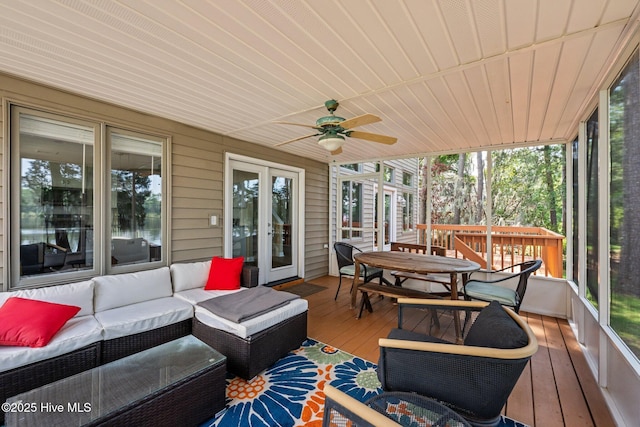 5410 Trade Winds Rd, New Bern, NC 28560 - sunroom featuring outdoor dining space, outdoor lounge area, a ceiling fan, and healthy amount of natural light