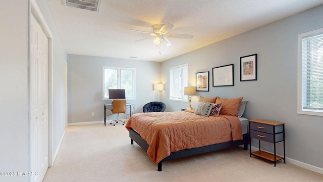 5410 Trade Winds Rd, New Bern, NC 28560 - bedroom featuring light colored carpet, a desk, and multiple windows