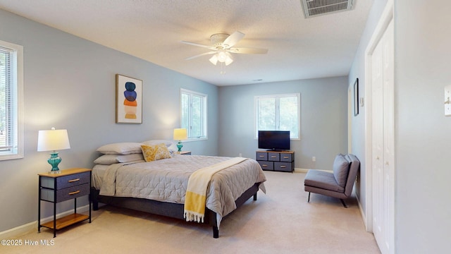 5410 Trade Winds Rd, New Bern, NC 28560 - bedroom with light colored carpet and a ceiling fan