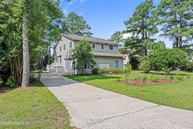 5410 Trade Winds Rd, New Bern, NC 28560 - traditional-style house featuring driveway and a front yard