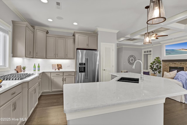 2233 Whiskey Branch Dr, Wilmington, NC 28409 - kitchen featuring stainless steel appliances, tasteful backsplash, a ceiling fan, recessed lighting, and light stone countertops