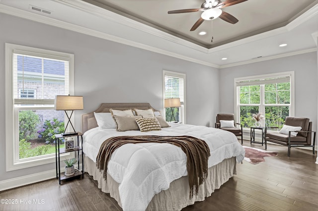2233 Whiskey Branch Dr, Wilmington, NC 28409 - bedroom with dark wood-style flooring, recessed lighting, a raised ceiling, and a ceiling fan