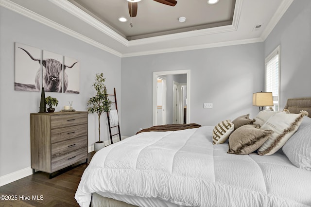 2233 Whiskey Branch Dr, Wilmington, NC 28409 - bedroom with a raised ceiling, dark wood-type flooring, recessed lighting, ornamental molding, and ceiling fan