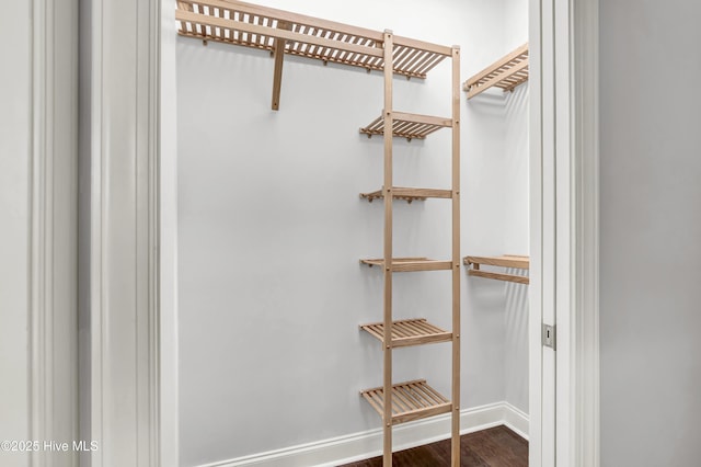 2233 Whiskey Branch Dr, Wilmington, NC 28409 - spacious closet featuring dark wood-type flooring