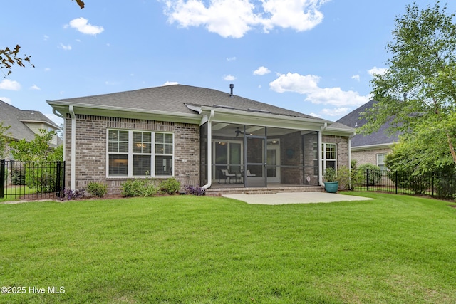 2233 Whiskey Branch Dr, Wilmington, NC 28409 - back of property with a sunroom, brick siding, a fenced backyard, a patio, and a ceiling fan