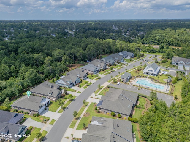 2233 Whiskey Branch Dr, Wilmington, NC 28409 - aerial perspective of suburban area featuring a heavily wooded area and a pool