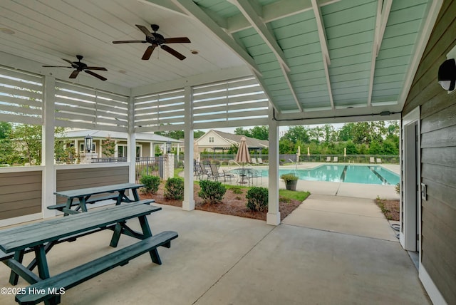 2233 Whiskey Branch Dr, Wilmington, NC 28409 - community pool with a ceiling fan and a patio