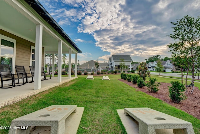 2233 Whiskey Branch Dr, Wilmington, NC 28409 - view of yard featuring a residential view and a patio area