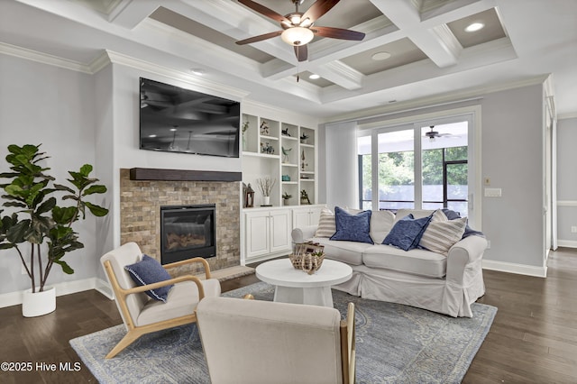 2233 Whiskey Branch Dr, Wilmington, NC 28409 - living area featuring a ceiling fan, crown molding, coffered ceiling, a brick fireplace, and dark wood-type flooring