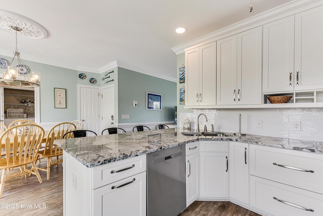 1726 W Beach Dr, Oak Island, NC 28465 - kitchen featuring stainless steel dishwasher, open shelves, light wood-style floors, a chandelier, and white cabinets