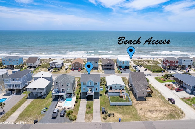 1726 W Beach Dr, Oak Island, NC 28465 - aerial view of residential area featuring extended coastline